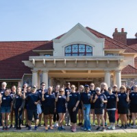 GVSU Alumni anchoring up in front of Alumni House & Visitor Center